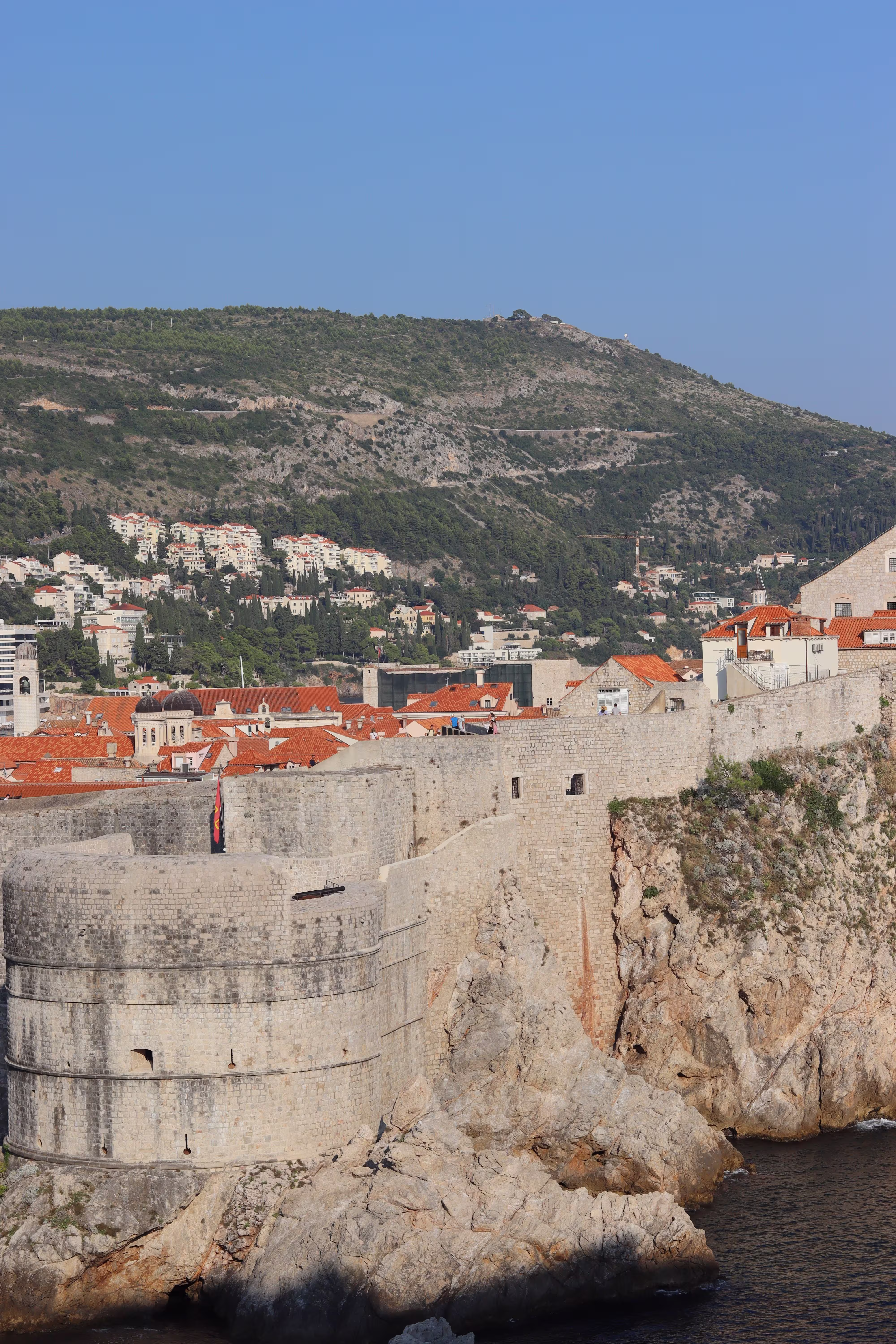 Aerial view of Dubrovnik's historic city walls and Fort Bokar