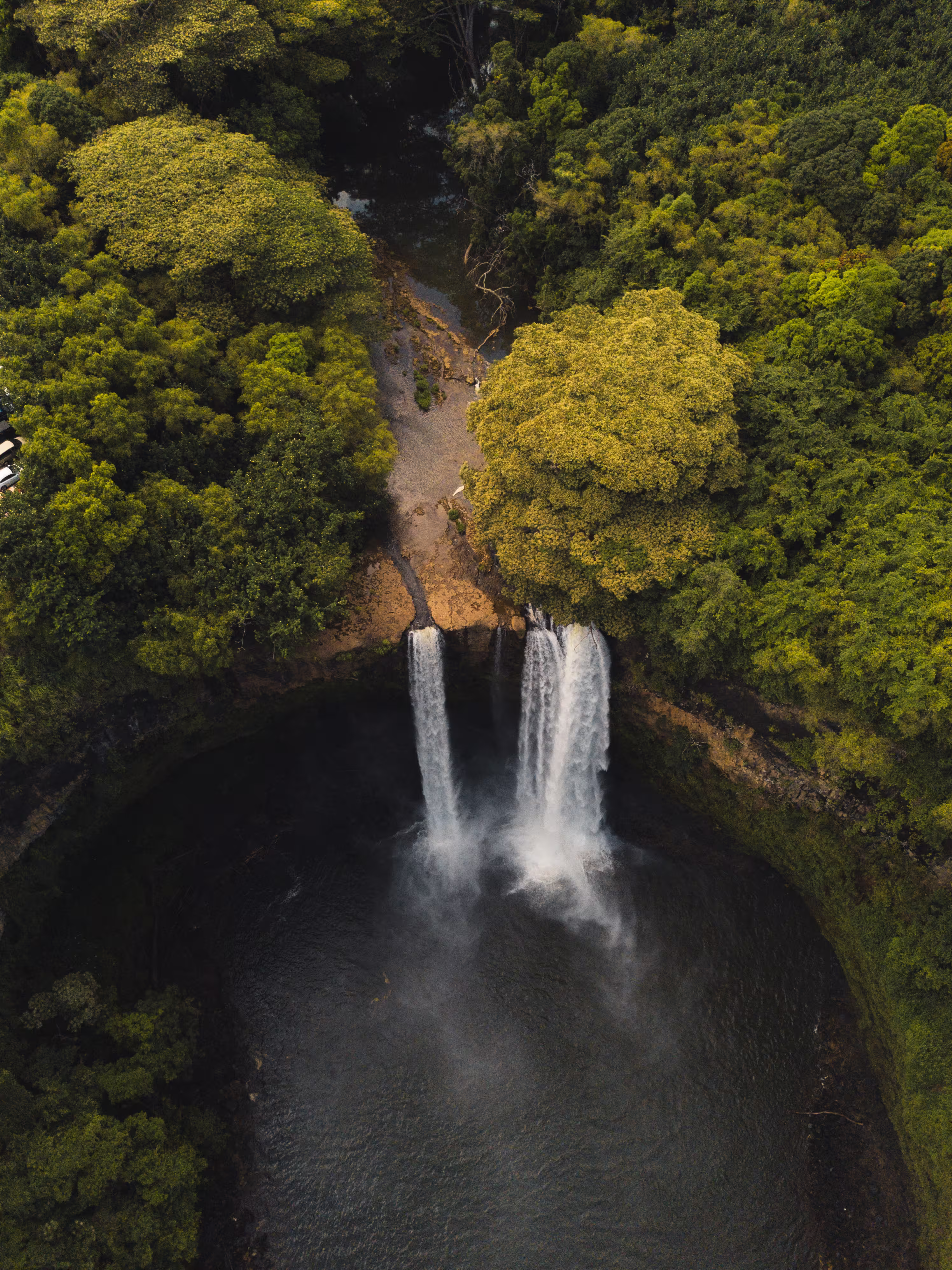 beautiful-waterfall-streaming-into-river