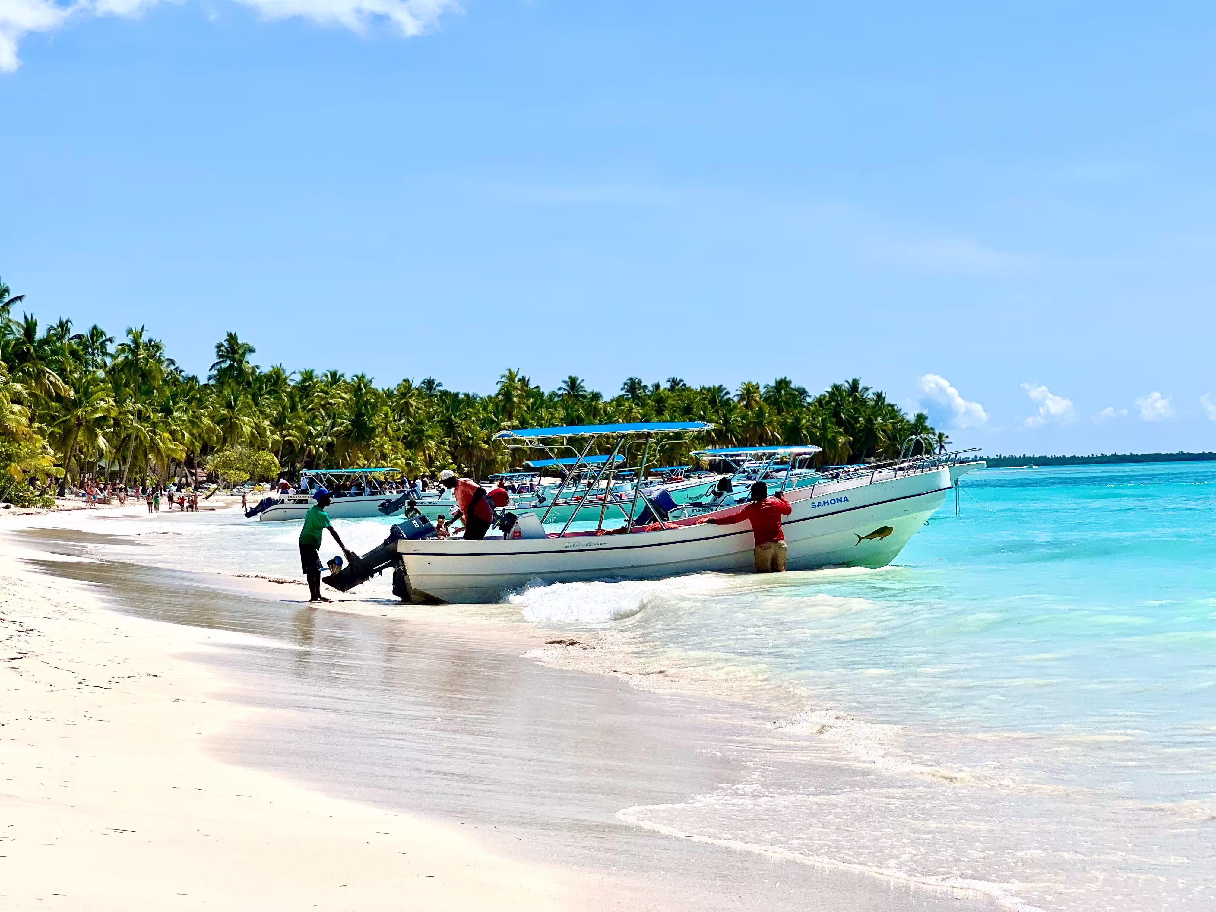 boats docked on the beach