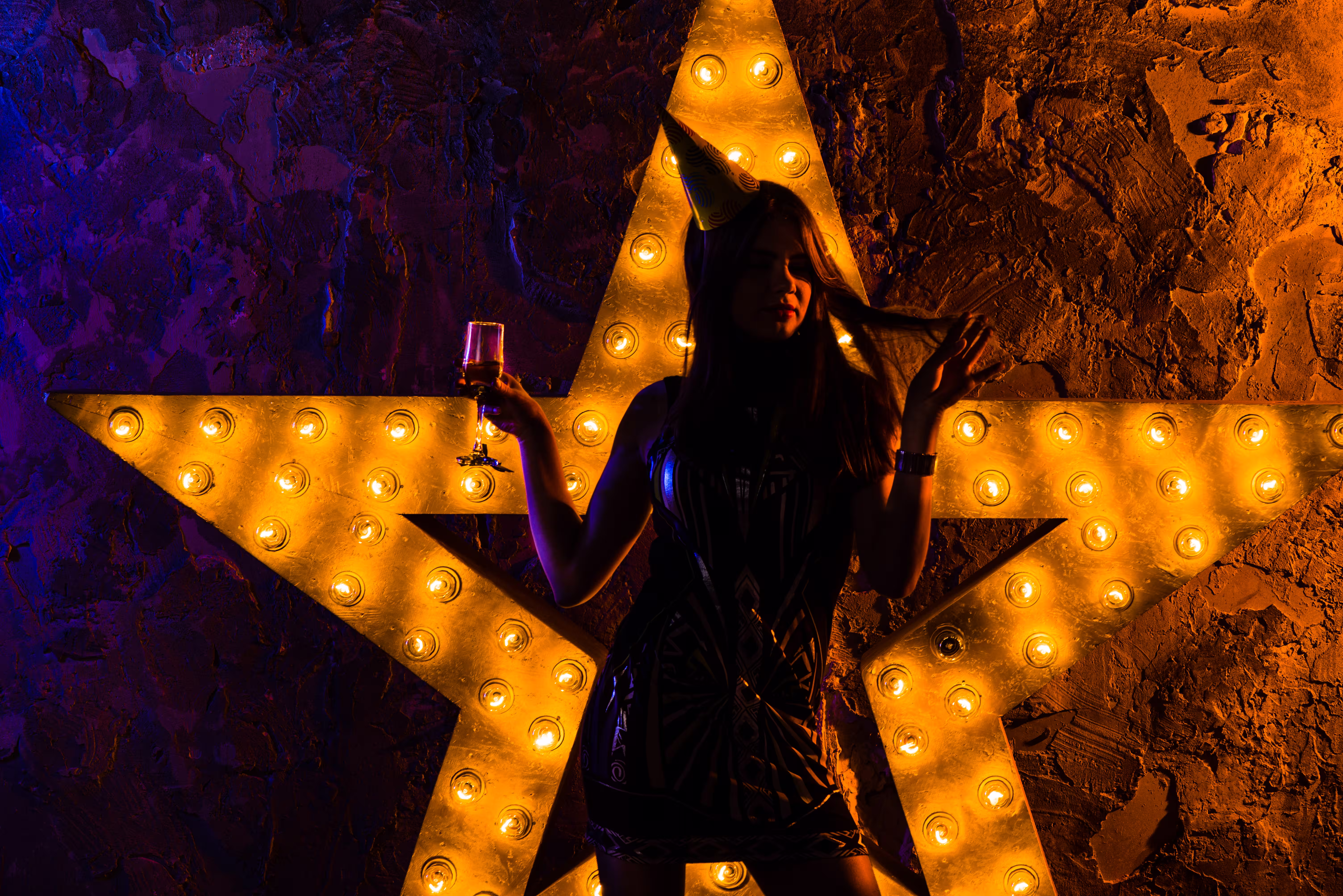 festive woman illuminated with star
