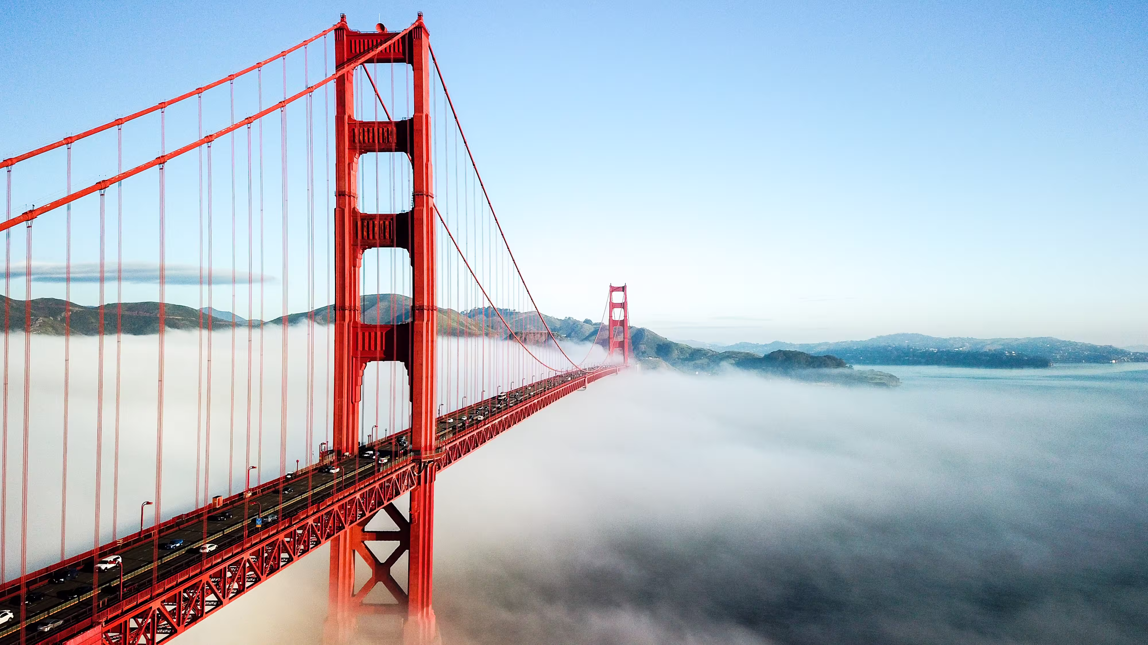 golden gate bridge river against sky