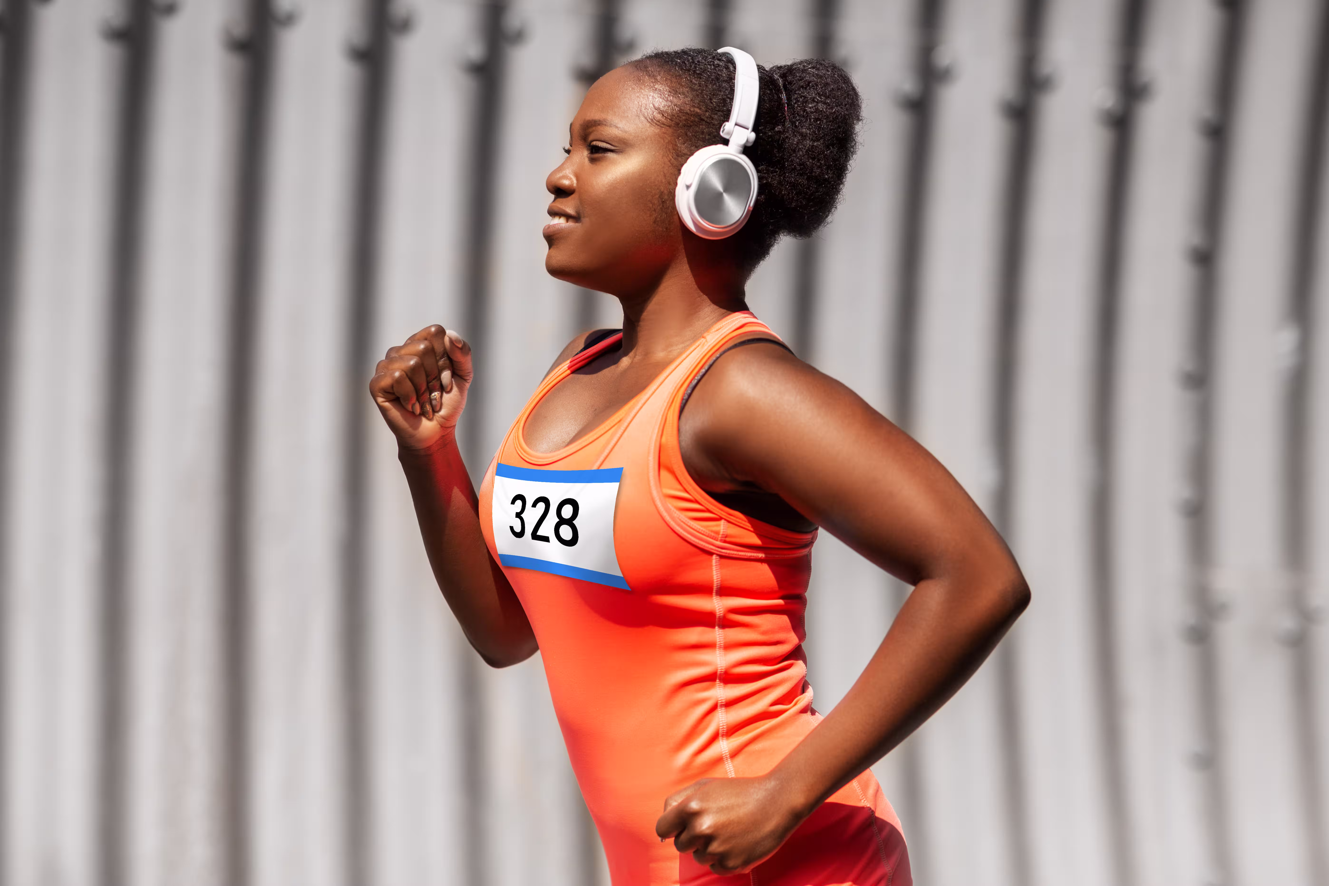 happy-african-american-woman-running-marathon