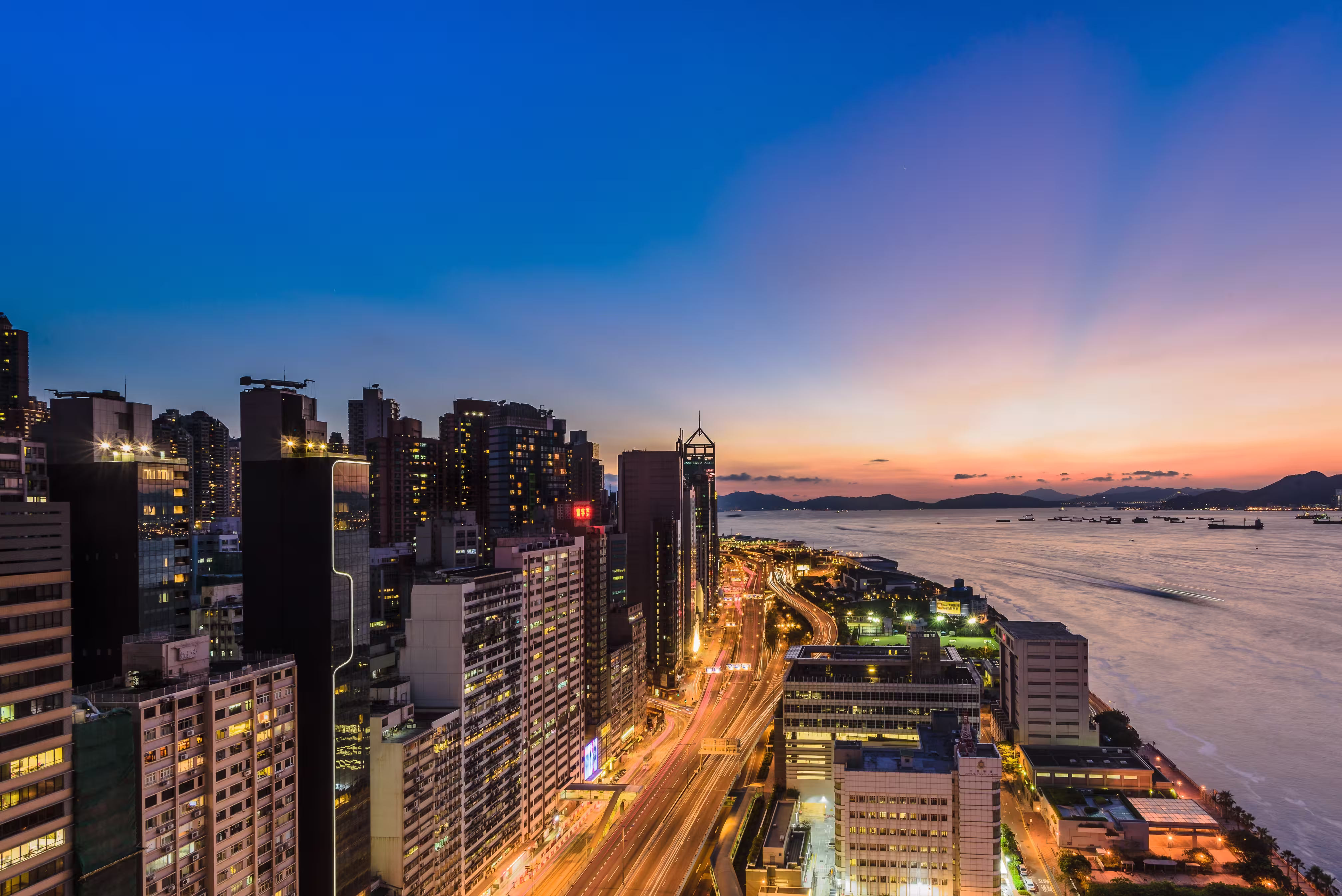 high-angle-shot-lights-buildings-skyscrapers-captu
