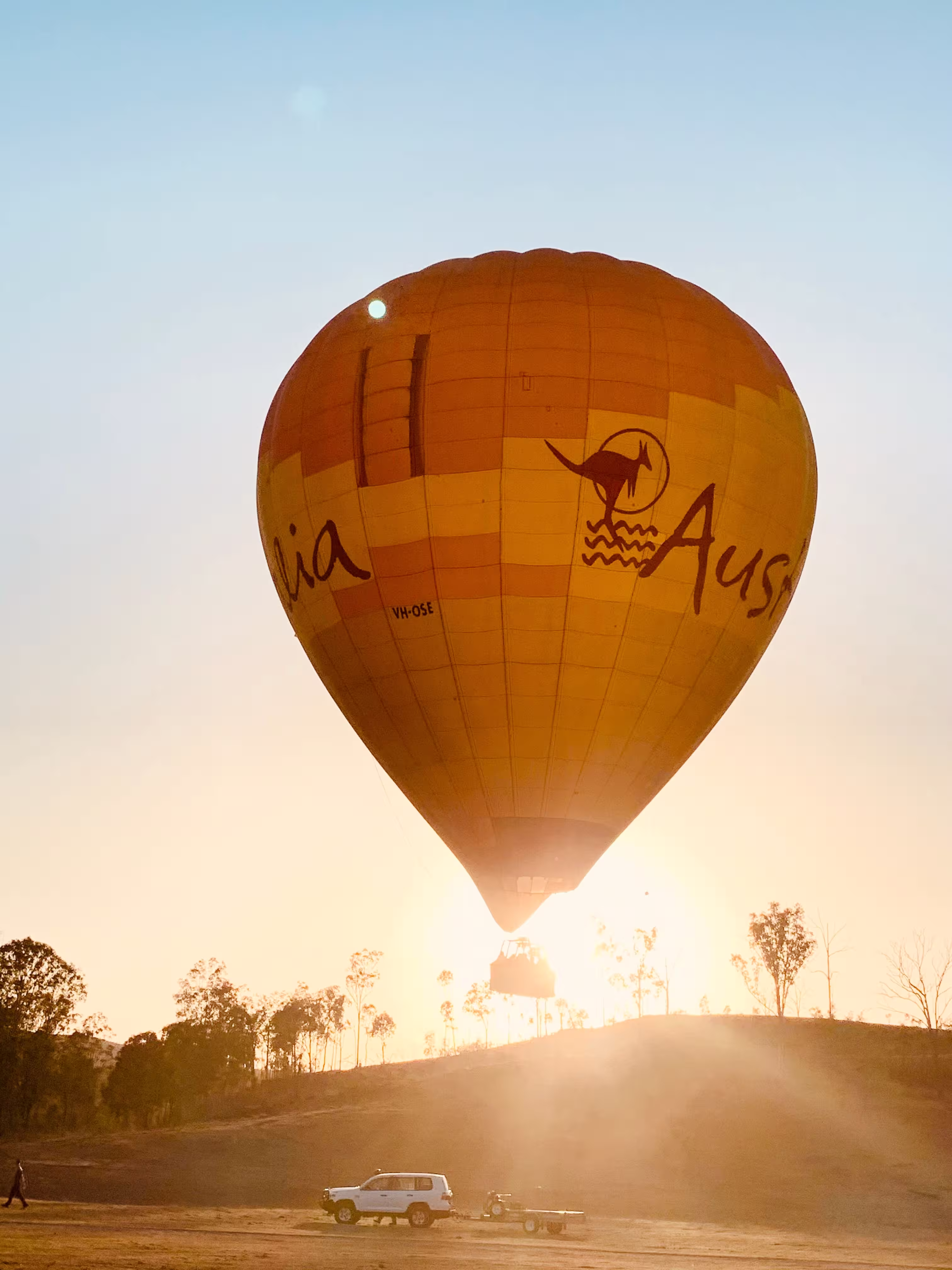 hot-air-balloon-taking-off-at-sunset