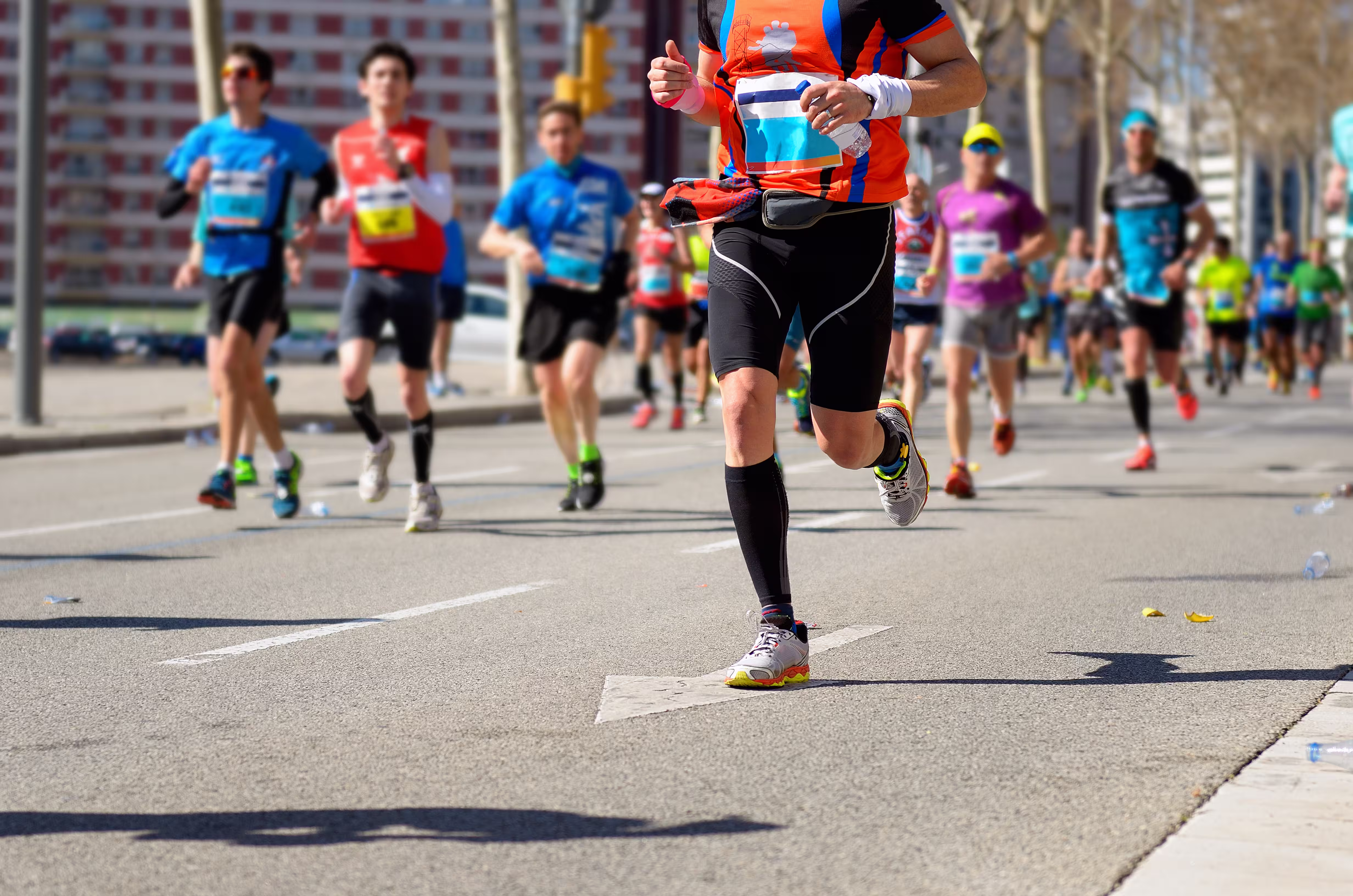 marathon running race many runners feet road racing