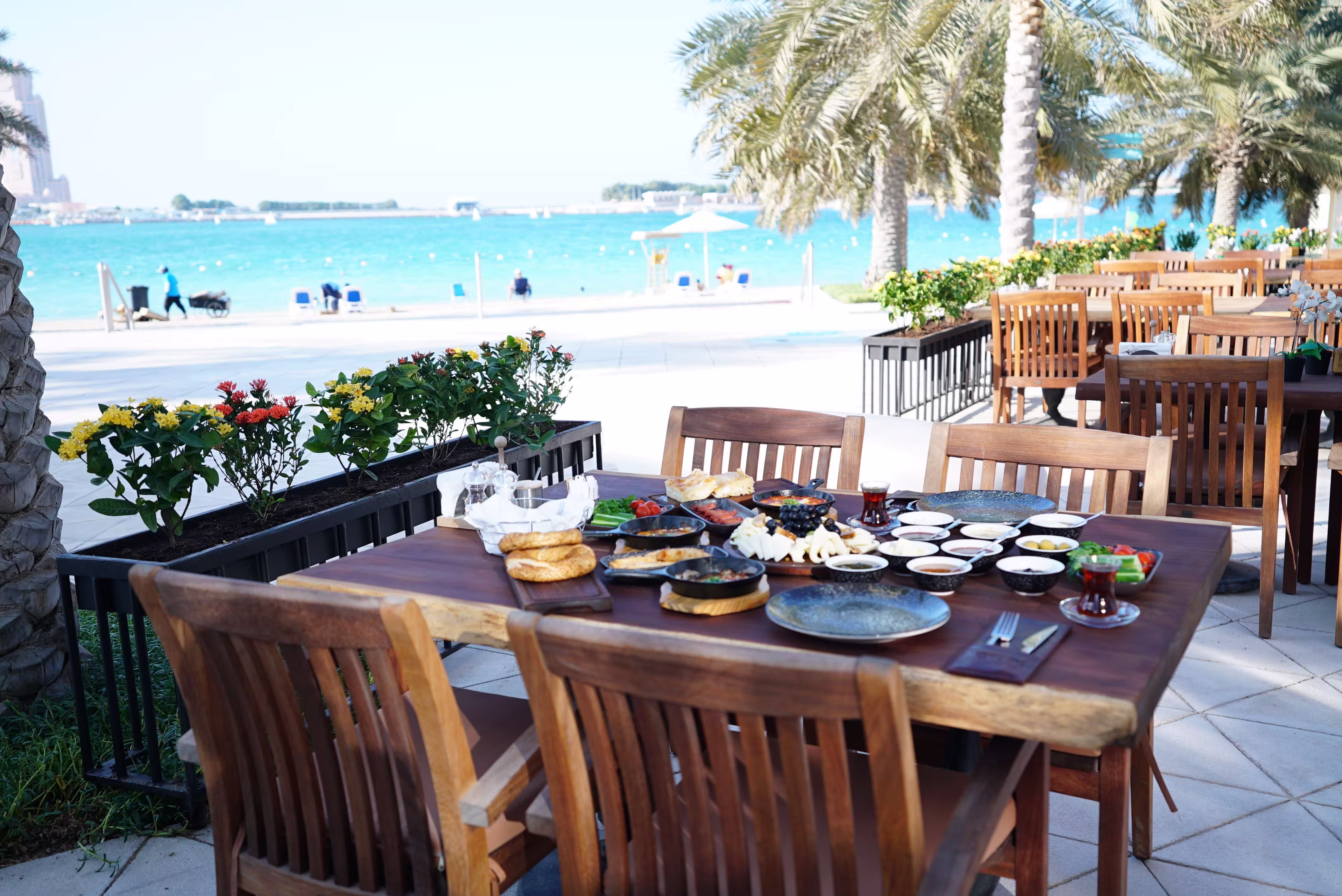 Outdoor dining by Abu Dhabi beachfront
