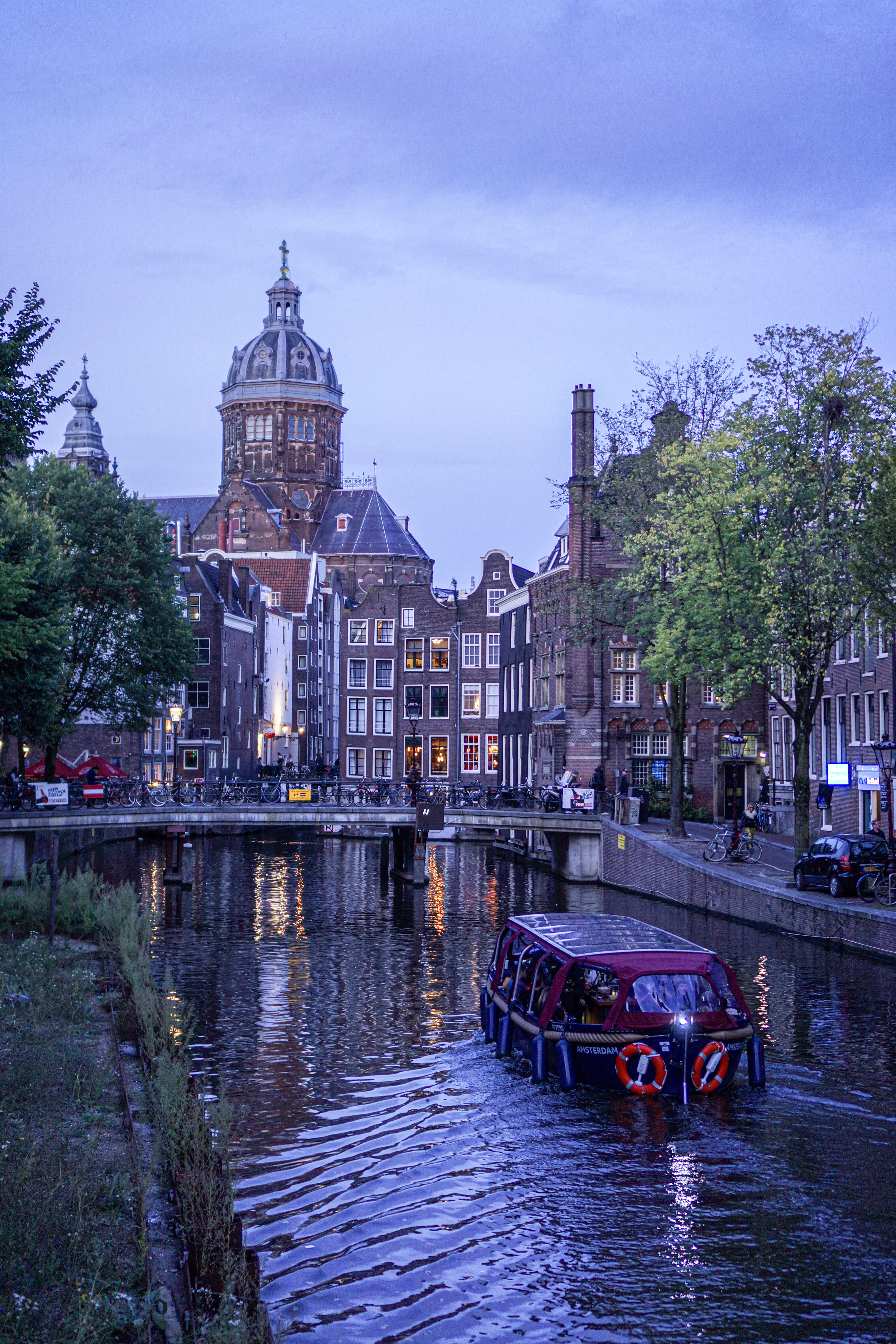 river-passing-through-city-buildings