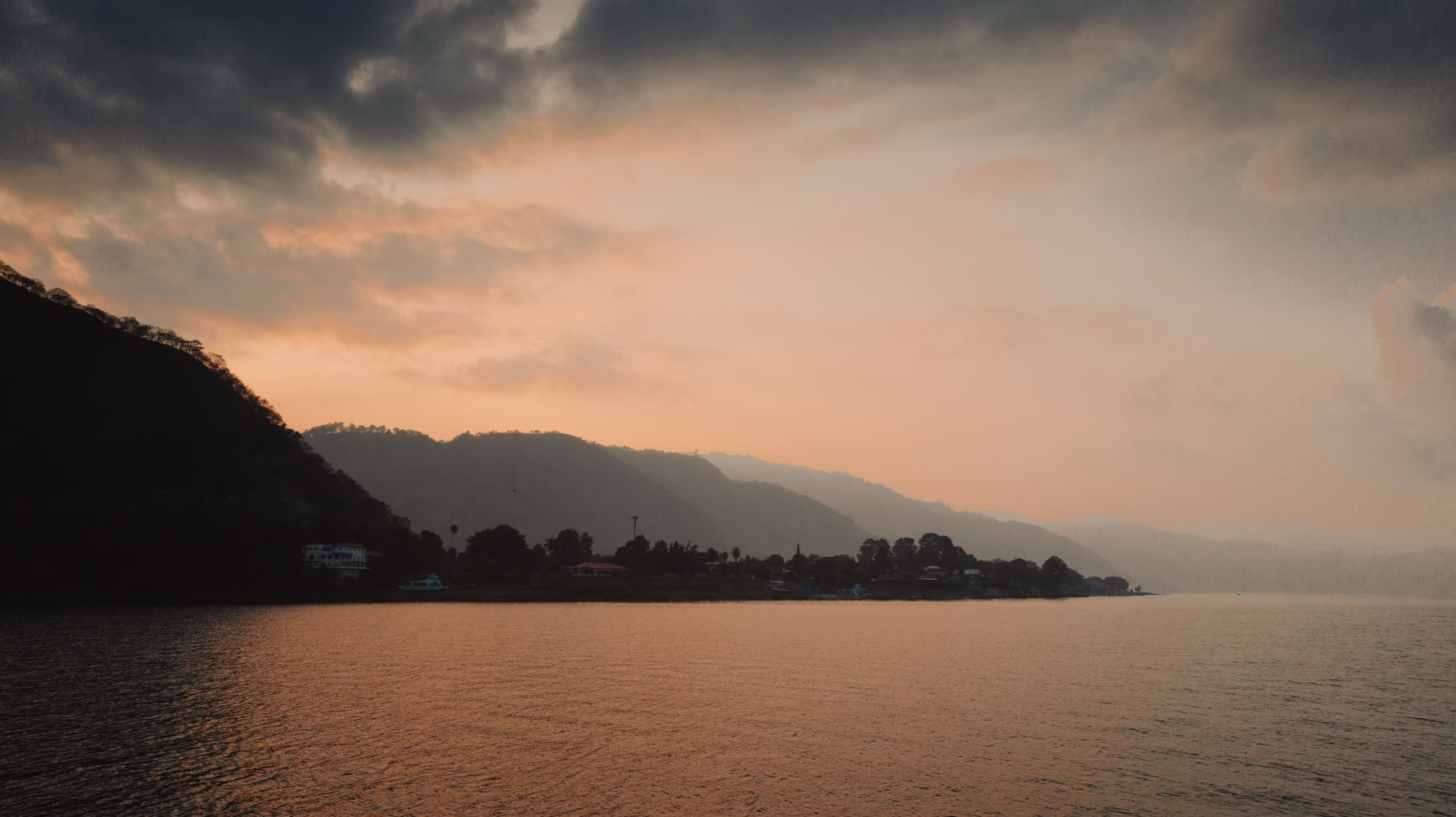Scenic view of mountains under a cloudy sky