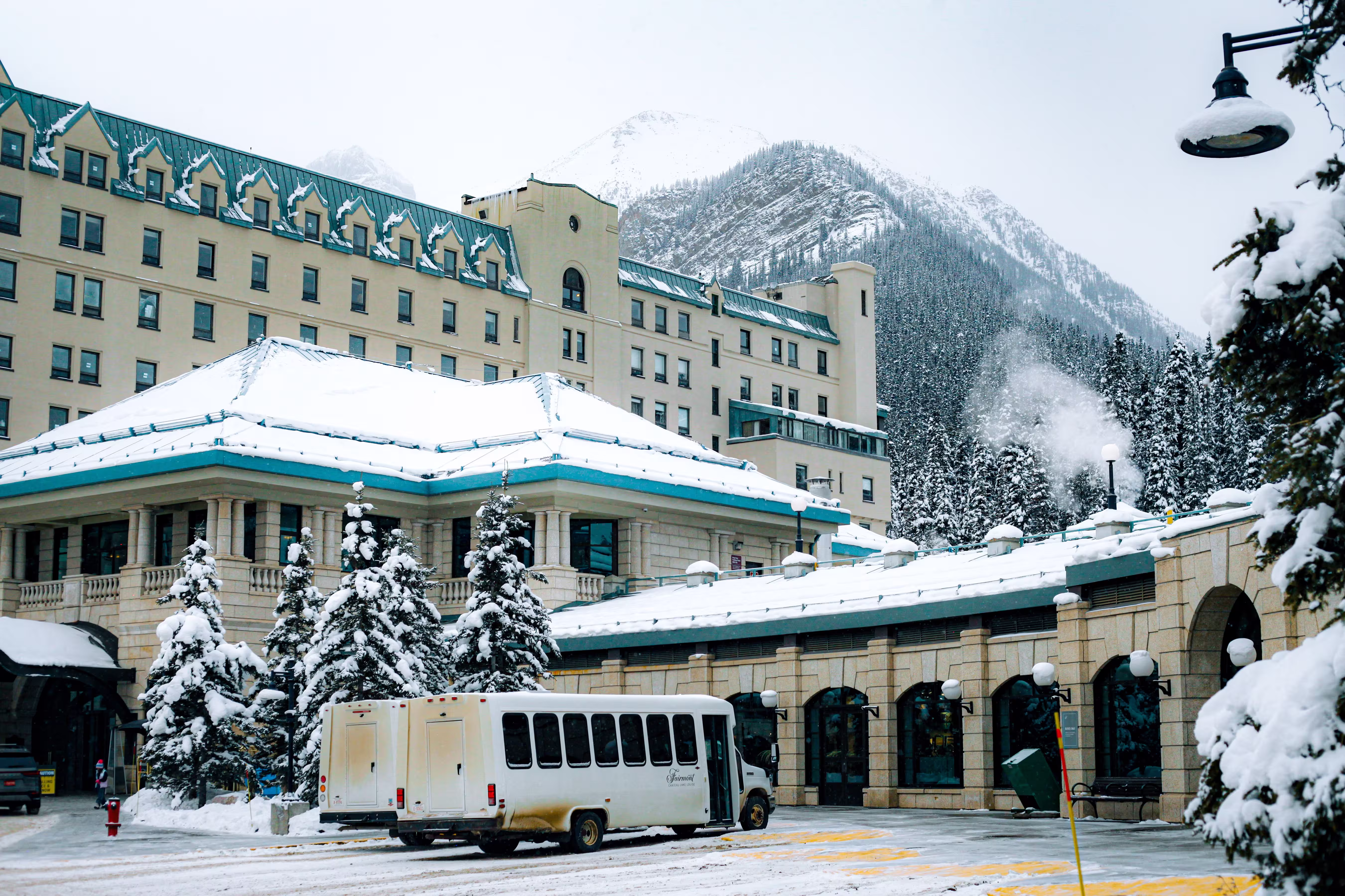Snowy resort with mountain backdrop in winter