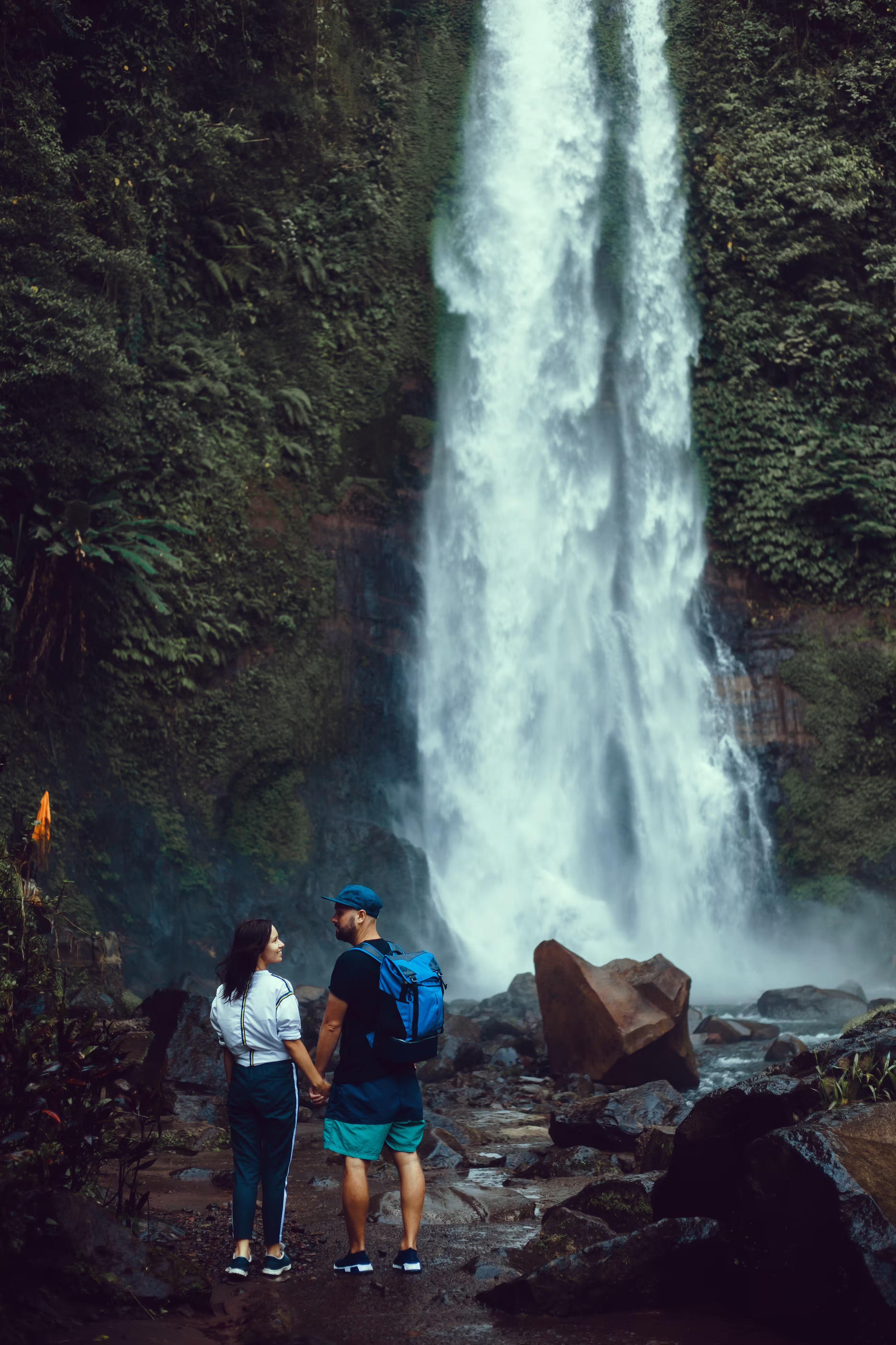 Couple posing at a waterfall in Central Bali