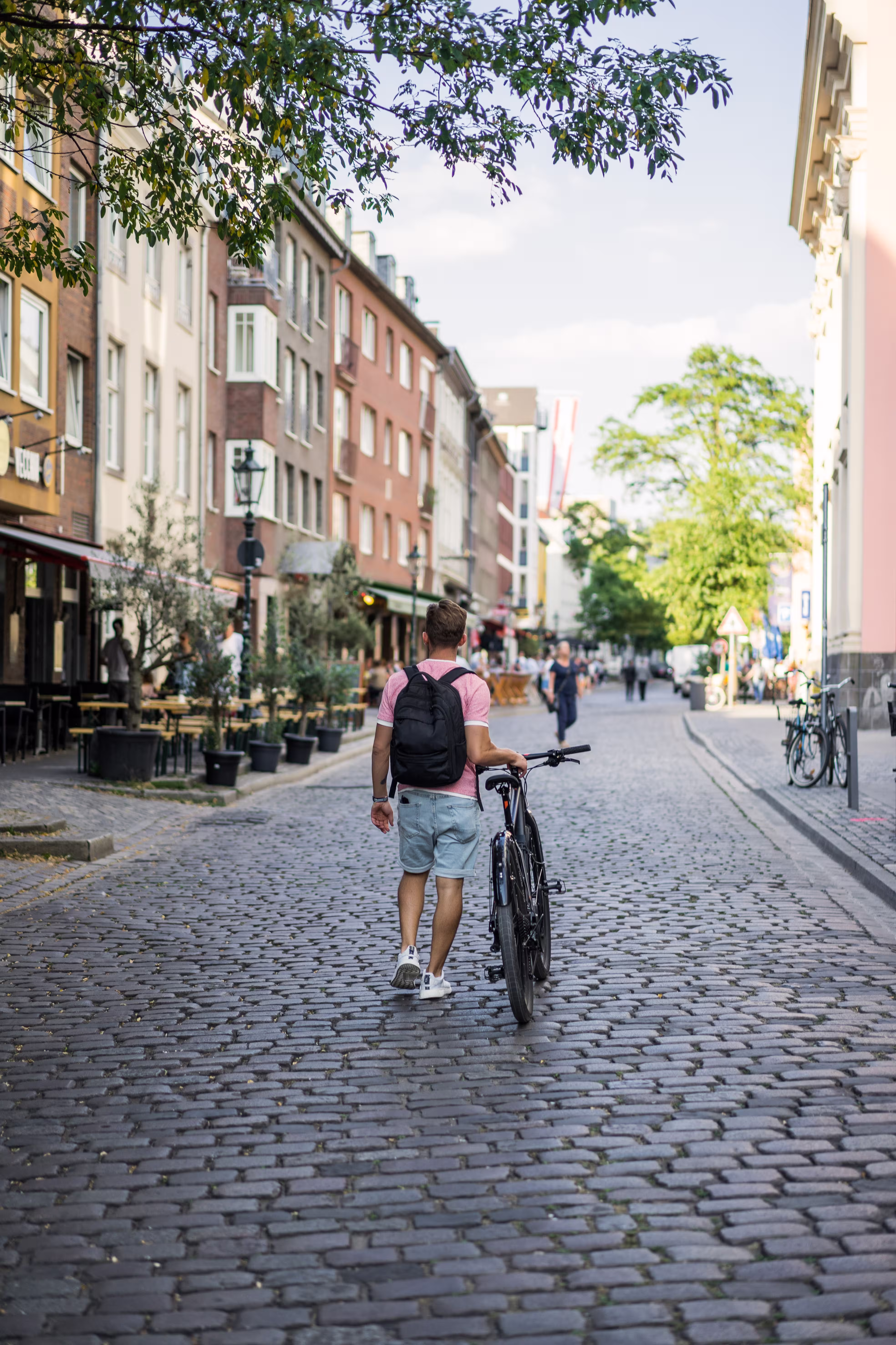 young-sports-man-bicycle-european-city-sports-urba